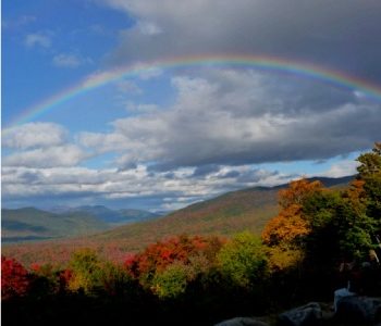 Encouraging you to wait for a rainbow on near a river.